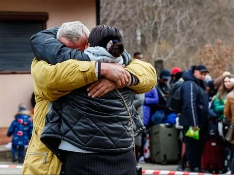 How many Ukrainians returned to Ukraine in 2023?